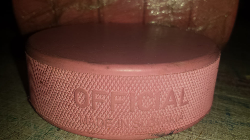 pink Ice Hockey puck